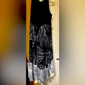 NWT! Adorable high low dress. Navy top and navy and white print bottom.